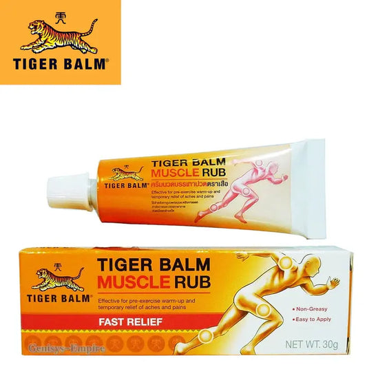 Emballage de la crème Tiger Balm Muscle Rub. Tube et boîte orange et jaune, indiquant 'TIGER BALM MUSCLE RUB'